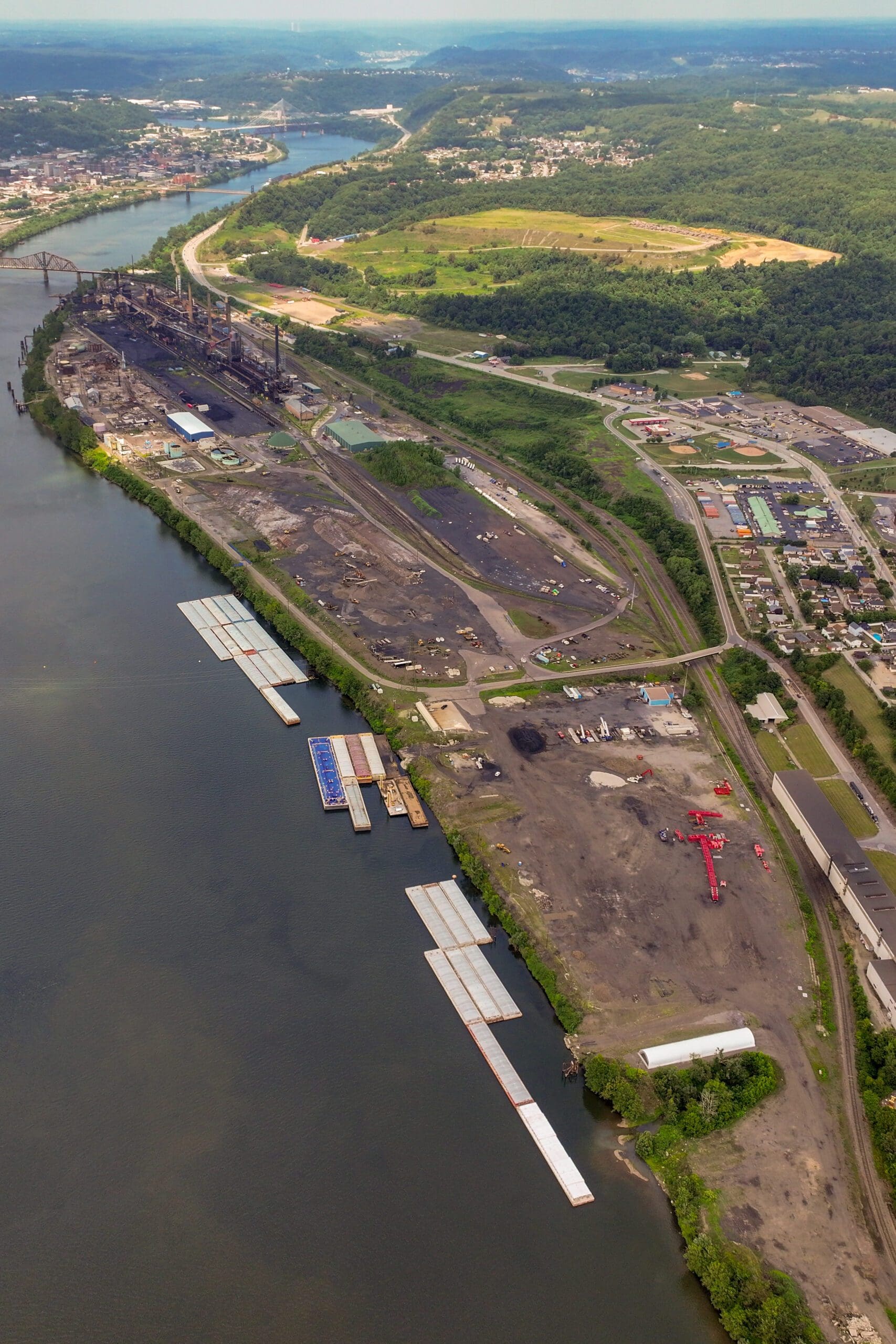 Aerial View of The Port of West Virginia trimodal facility on the Ohio River with river barges cargo